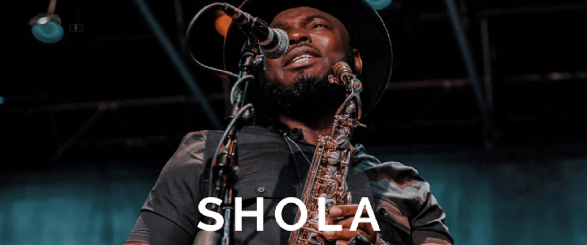 Shola Emmanuel classic signature look